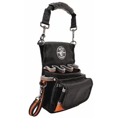 Black nylon tool pouch with open-top closure and belt slot attachment for belts up to 2 inches wide. Designed to carry tape rolls, it features 9 pockets for organizing tools. Suitable for use in electrical, construction, and maintenance applications.