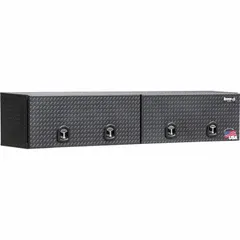 This topside box features double flip-up doors with a T-handle compression lid and a keyed lock. Finished in matte black, it is designed for secure storage on truck beds, providing quick access to tools and equipment.
