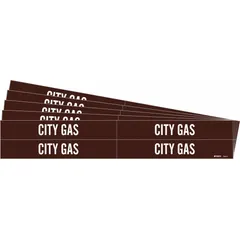 These adhesive pipe markers identify city gas lines in piping systems. Each marker has a brown background with white legend reading 'City Gas' and fits pipe outer diameters from 3/4 to 2-3/8 inches. Pack includes 4 markers without arrows, supplied in a 5-pack configuration.