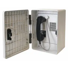 Surface-mount telephone in gray Hytrel plastic housing with a keypad and spring door kit. Corrosion resistant for outdoor use in hazardous areas. Features a latching door and operates on PSTN networks. Suitable for industrial environments requiring durable voice communication.