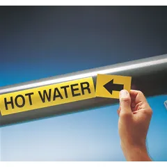 Green adhesive pipe marker with white 'Make-Up Water' legend and directional arrows. Designed for pipes with outer diameter of 1-1/2 to 2 inches. Each roll contains 25 markers for identifying make-up water lines in piping systems.