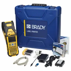 Portable label printer with 2-inch, 300 dpi printhead. No wireless connectivity. Includes battery, AC adapter/charger, self-laminating cable wraps, and Brady Workstation Basic Design Suite software. Suitable for on-site labeling of cables, panels, and equipment in industrial and facility settings.