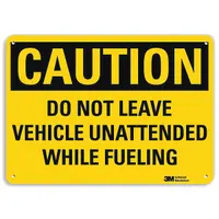 This 10 x 14 inch aluminum sign features mounting holes for easy installation. It displays a caution message reminding drivers not to leave vehicles unattended while fueling. Suitable for use at fueling stations in industrial, commercial, and fleet environments