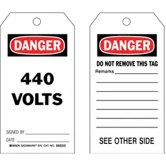 Black electrical hazard tags with red and white printing, each featuring fields for '440 Volts Signed By: Date:' and 'Danger/Do Not Remove This Tag Remarks:'. Supplied in a 100-pack with cotton string fasteners. Used for marking electrical hazards and supporting lockout/tagout procedures.