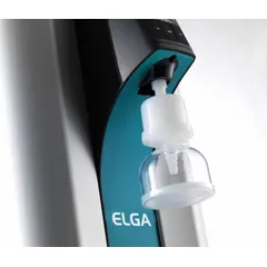Wall-mounted Type I water purification system producing ultrapure water with 18.2 Megohm resistivity at 1.2 lpm. Removes ions from potable mains water supply via 5/16" OD feed connection. Operates on 100-240V AC. Suitable for critical laboratory applications requiring high-purity water.