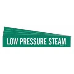 Green adhesive pipe marker with white legend text reading 'Low Pressure Steam'. Fits pipe outer diameters from 2-1/2 to 7-7/8 inches. Supplied without directional arrows. Used to identify low pressure steam piping in industrial facilities.