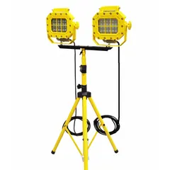 This hazardous location work light features two LED lamp heads delivering 5600 lumens maximum brightness. It operates on 90 to 277V AC with a single brightness level. The yellow frame and IP65 rating provide resistance to dust and water jets. Suitable for industrial environments requiring safe, bright illumination.