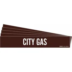 This adhesive pipe marker features a brown background with white legend text reading 'City Gas'. It is designed for pipes with an outer diameter of 8 inches and larger. The marker is applied to clean pipe surfaces for identification of gas lines in industrial facilities. This pack contains 5 markers, each without directional arrows.