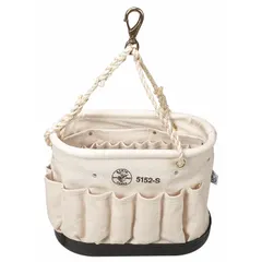 This canvas bucket bag measures 14 inches wide by 10 inches high in off-white. It features an open top and 41 pockets for organizing tools and accessories. A single handle with a snap hook allows for hanging on a ladder or work site. Suitable for carrying and accessing hand tools, meters, and small parts in industrial or maintenance settings.