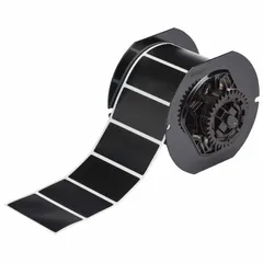 Thermal transfer precut label roll with rubber permanent adhesive, 750 labels per roll, each label 1 1/4 in x 2 3/4 in. Compatible with i3300 printer series. Suitable for industrial asset identification, cable marking, and safety labeling on rough, oily, or curved surfaces.