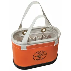 This orange plastic bucket bag measures 14 inches wide by 10 inches high and features an open top with 14 pockets for organizing tools and equipment. Drain holes allow water and debris to escape, making it suitable for use on job sites where tools need to be kept accessible and clean.