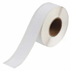 White matte polyester continuous label roll measuring 1 1/8 in by 100 ft. Inkjet print-receptive material designed for indoor use. Compatible with BradyJet J2000 printer series. Used for labeling equipment, cables, and panels in industrial environments.