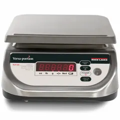 This food scale from RICE LAKE WEIGHING SYSTEMS features a 9 3/8 in by 7 7/8 in weighing surface and readability of 1 g/0.002 lb/0.02 oz. With an IP68 rating, it is protected against dust ingress and continuous immersion in water, making it suitable for washdown environments in commercial food preparation areas.