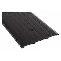 This 6 ft aluminum saddle threshold features a fluted transition surface. It is designed to bridge the gap under doors, helping to seal against drafts, moisture, and debris in commercial or industrial doorways