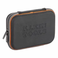 This polyester tool case features a hinged lid for secure closure and easy access. With dimensions of 6-1/2 inches wide, 8-3/4 inches deep, and 2-1/4 inches high, it is suited for organizing and carrying small hand tools and accessories. The black, gray, and orange color scheme provides visibility.