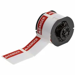 White polyester precut label roll with rubber adhesive for indoor/outdoor use. Halogen-free material. Compatible with i5300 printer series for on-demand printing of danger warnings in industrial environments.