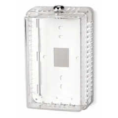 This single-wall plastic thermostat guard features a clear snap-on cover and solid base, with lock and key for security. Inside dimensions: 6-13/16 in H x 4 in W x 3 in D; outside: 8 in H x 5 in W x 3-3/8 in D. Designed to enclose thermostats in commercial or industrial settings, preventing unauthorized adjustments.