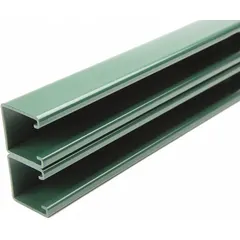 This side-to-side strut channel is made of steel with a painted green finish. It has a solid design with no pre-punched holes, 12 ga gauge, and is used in industrial framing and support systems for mounting piping, conduit, and equipment in indoor applications.