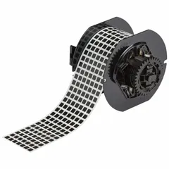 Thermal transfer precut label roll with rubber permanent adhesive. Each label measures 1/4 in x 1/4 in, supplied in a roll of 20,000 labels. Compatible with BBP33 printer series. Used for permanent identification in industrial settings, such as asset tagging, cable marking, and component labeling.