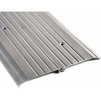 Aluminum saddle threshold, 6 ft length, fluted transition type. Used to seal gaps under doors in commercial and industrial doorways, providing a smooth walking surface and blocking drafts, debris, and pests