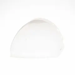 This clear nylon replacement visor features a toric shape for enhanced optical clarity and splash protection. It is designed for use in industrial environments where resistance to chemical splashes, flying debris, and moderate heat is required. Suitable for manufacturing, chemical processing, and maintenance applications.
