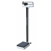Mechanical physician scale for weighing patients in clinical settings. Weighs in pounds (lb) and is FDA compliant. Includes a wrench for assembly or adjustment