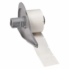 White matte self-extinguishing vinyl precut label roll, 1 in x 1 in, 250 labels per roll. Designed for use with M710 printer series and M7-R4300 ribbon. Suitable for identification of cables, wires, and small cylindrical surfaces in industrial environments.