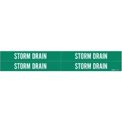 Green adhesive pipe markers with white 'Storm Drain' legend, designed for pipe outer diameters from 3/4 to 2-3/8 inches. Each pack contains four markers without arrows, used to identify storm drain piping in industrial and facility settings.