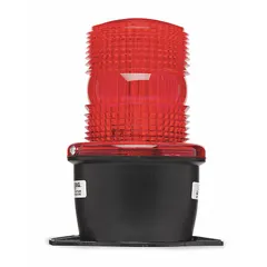 Wired strobe light with red lens and strobe tube type, operating on 120V AC. Designed for wall-mount installation, with overall diameter 3 1/8 in and overall height 5 13/16 in. Used for visual signaling in industrial settings such as manufacturing and material handling.