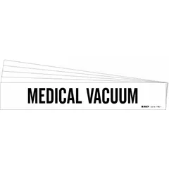 White adhesive pipe marker with black legend text for identifying medical vacuum piping. Fits pipe outer diameters from 2-1/2 to 7-7/8 inches. Each pack contains one marker without arrows. Suitable for use in healthcare facilities and other settings requiring clear pipe identification.