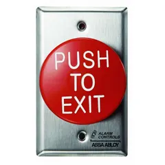 The ALARM CONTROLS TS-60 is a push-to-exit button with a red/silver plastic housing. It measures 2 3/4 inches wide and 2 1/4 inches deep. This button is used for egress activation in access control systems, allowing personnel to release a door lock and exit.