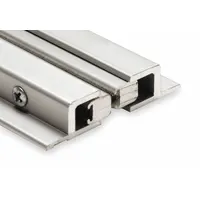 This door astragal features an aluminum flange and a polypropylene brush insert. It measures 8 ft in length, 1 3/16 in width, and 1 3/16 in height. Used to seal the gap between paired doors, it helps block drafts, light, and pests in commercial and industrial doorways