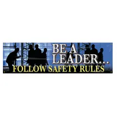Poly sheeting banner printed on one side with a leadership-themed safety message. Measures 28 in x 96 in nominal size. Suitable for indoor or outdoor use in industrial facilities to promote safety compliance. No wind slits included.