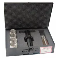 This thread repair kit includes helical inserts and installation tools for repairing damaged left-hand, 7/8"-9 coarse threads in metal components. The kit has a plain finish and an overall length of 1 5/16 inches. It is used in industrial maintenance to restore threaded holes in machinery and equipment