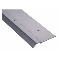This 4 ft long stainless steel bumper-seal threshold provides a smooth transition while sealing the gap under a door. It is used in commercial and industrial settings to block drafts, dust, and pests, and to accommodate foot or cart traffic