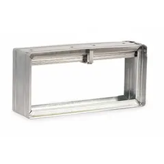 Rectangular fire damper with gravity-operated curtain blade closure, designed for vertical mounting in HVAC ductwork. Constructed from galvanized steel. Dimensions: 9 3/4 in width, 5 3/4 in height, 3 3/4 in length. Used to maintain fire resistance ratings in duct systems penetrating vertical partitions.