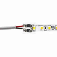 Tape-to-wire connector for low-voltage tape light systems. Screw terminal type accepts 20 AWG to 16 AWG wires. Used to join tape light strips to lead wires in linear lighting installations.