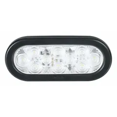 This LED backup/reverse light features a clear oval lens and grommet mount for permanent installation. It connects via a wire harness and complies with SAE J1398. Typical applications include providing rearward illumination on vehicles and equipment during reversing maneuvers.
