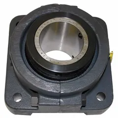 This 4-bolt flange-mount tapered roller bearing has a 1 1/2 in cylindrical bore and a cast iron housing with set screw locking. It is lubricated with NLGI #2 equivalent grease and requires a 1/2 in mounting bolt. The unit measures 5 3/8 in length and is used in power transmission systems to support rotating shafts under combined radial and thrust loads, such as on conveyors, fans, and material handling equipment.