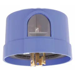 This turn-locking photocell automatically controls lighting based on ambient light levels. It features SPST switching and is rated for 120-277V AC with 160 J surge protection. The unit mounts directly into a standard photocell receptacle, suitable for dusk-to-dawn lighting control in outdoor industrial and commercial applications such as parking lots, building perimeters, and street lighting.