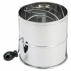Manual flour sifter with 8-inch diameter and 1/8-inch mesh size. Aerates and breaks up lumps in flour and dry ingredients for consistent texture in baking applications.