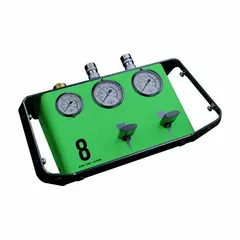 Lifting bag valve with dual deadman-style operation requiring both hands for enhanced safety. Features a 5/16 in Quick Connect fitting for hose attachment. Used to control inflation and deflation of industrial lifting bags in applications such as rescue, construction, and heavy lifting.