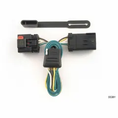 The CURT 7-Way Flat Electrical Plug connects a towing vehicle's lighting and brake controller to a trailer. It features a flat blade configuration for secure connections in towing applications. This plug is used for heavy-duty trailers, RVs, and utility trailers requiring a 7-pin connection.