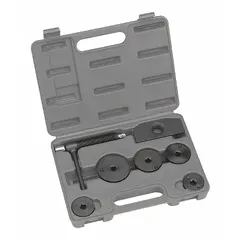 This carbon steel disc brake caliper tool kit is designed for Ford and GMC vehicles with 4-wheel disc brakes. It includes a forcing screw and has an overall length of 10 1/4 inches. Used to aid installation of brake pads during brake servicing.