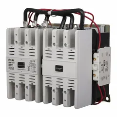 Reversing NEMA magnetic contactor with 3 poles, NEMA Size 3, rated 90 A at 120V AC. Used to control forward and reverse rotation of three-phase motors in applications such as conveyors, hoists, and pumps.