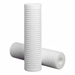 This string-wound polypropylene water filter cartridge has an overall height of 18 1/2 inches. It is used in water filtration systems to remove sediment, silt, and fine particulates from water, protecting downstream equipment and maintaining water clarity.