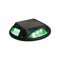 Solar-powered LED light with green lens for marking rail and track areas. Operates at 1.2V, with 4 13/16 in overall diameter and 7/8 in overall height. Provides self-contained illumination without external wiring