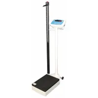 Digital physician scale for patient weighing in medical settings. Weighs in kilograms with 0.05 kg readability and 0.1 lb readability. Features a column-mounted indicator and includes a charger. FCC compliant
