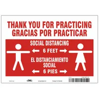 Aluminum sign with red background, nominal size 7 in x 10 in, 0.032 in thick. Features bilingual Spanish text 'Stand Here – Thank You For Practicing Social Distancing'. Includes mounting holes for wall attachment. Not retroreflective. Suitable for marking waiting zones in facilities to promote distancing