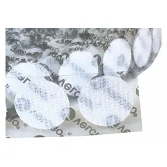 Pre-cut hook disc with a 1/2 in overall diameter, made of white nylon. Features an acrylic adhesive backing for bonding to clean, dry surfaces. Used for fastening lightweight items in assembly, cable management, and signage applications.